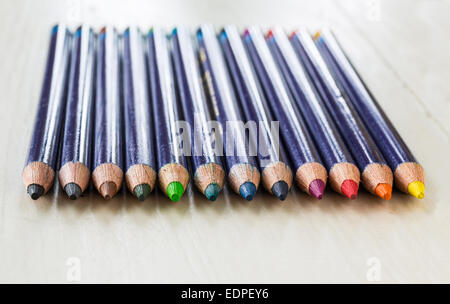 Sharpened colored pencils in a row. Stock Photo