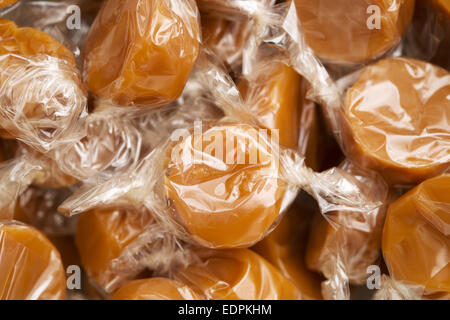 cellophane wrapped chewy dairy toffees Stock Photo