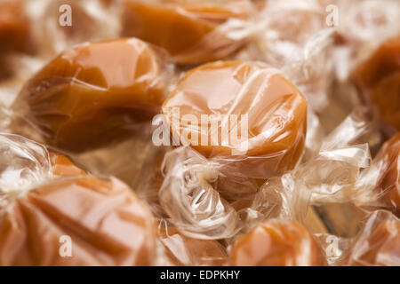 cellophane wrapped chewy dairy toffees Stock Photo