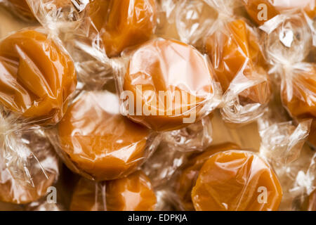 cellophane wrapped chewy dairy toffees Stock Photo