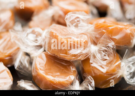 cellophane wrapped chewy dairy toffees Stock Photo