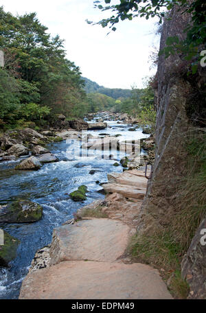 The Fishermans Path alongside the River Glaslyn in the Aberglaslyn Pass near Beddgelert, North Wales, UK Stock Photo