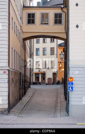 Backstreet in Stockholm old town, Gamla Stan, as viewed from Skeppsbron. Tockholm, Sweden Stock Photo
