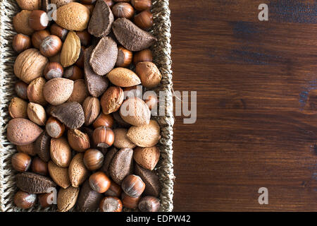 Basket of whole nuts in shell with copy space, can be used vertically or horizontally. Stock Photo