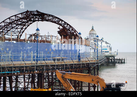 Eastbourne Pier, Eastbourne, East Sussex, England, UK. Showing rebuilding work in Jan 2015 after the serious fire of 2014 Stock Photo