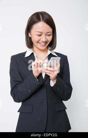 Businesswoman Using Mobile Phone Stock Photo