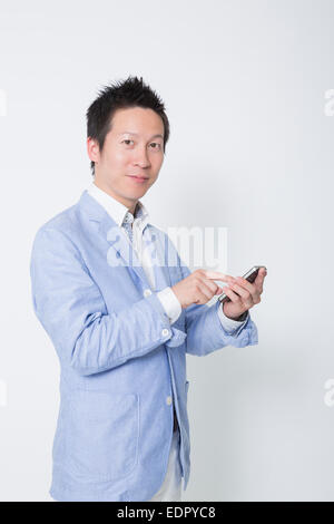 Businessman Using Mobile Phone Stock Photo