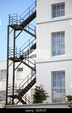 Exterior emergency fire escape stairs on a hotel building. England, UK Stock Photo