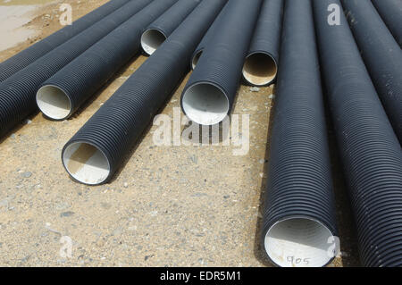 Corrugated plastic pipes at a construction site Stock Photo