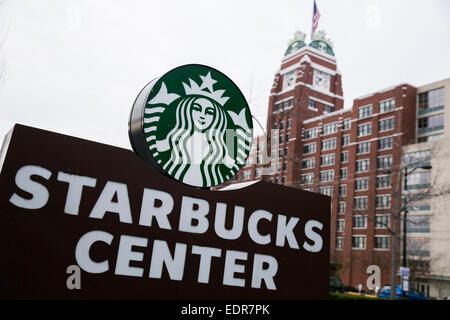 A logo sign outside the headquarters of the Starbucks Coffee Company in Seattle, Washington. Stock Photo