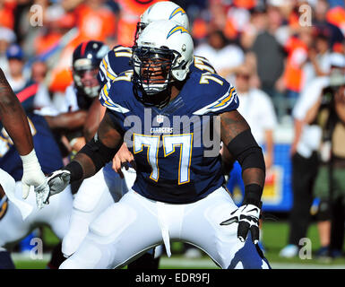 San Diego Chargers tackle King Dunlap (77) blocks Buffalo Bills cornerback  Nickell Robey (37) as teammate Eddie Royal (11) breaks away from Jarius  Wynn (92) to score a touchdown during the first