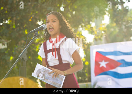 Havana, Cuba. 8th Jan, 2015. A Cuban young pioneer delivers a speech marking the arrival of the Liberty Caravan in the Cotorro District of Havana, Cuba, on Jan. 8, 2015. Cuban youths and revolutionary veterans on Thursday repeated the same journey of Cuban revolutionary leader Fidel Castro to celebrate and commemorate the victory of the revolution. Credit:  Liu Bin/Xinhua/Alamy Live News Stock Photo