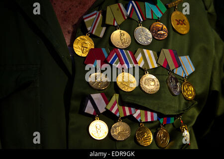 Havana. 8th Jan, 2015. Photo taken on Jan. 8, 2015 shows medals for military merits of a Cuban veteran at a ceremony marking the arrival of the Liberty Caravan in the Cotorro District of Havana, Cuba. Cuban youths and revolutionary veterans on Thursday repeated the same journey of Cuban revolutionary leader Fidel Castro to celebrate and commemorate the victory of the revolution. Credit:  Liu Bin/Xinhua/Alamy Live News Stock Photo