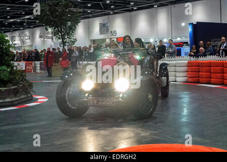 London, UK. 08th Jan, 2015. London Classic car show at Excel London. 1928 Vintage Bentley 4 1/2 Litre tourer driving in the driving display on the Grand Avenue. Credit:  Martyn Goddard/Alamy Live News Stock Photo