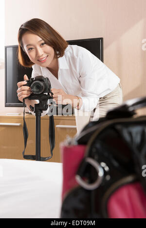 Online seller taking pictures of products Stock Photo