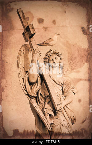 Retro and vintage styled image of a marble statue of an Angel near Saint Angel Bridge in Rome, with a cross in arms and a seagul Stock Photo