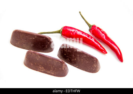 Chocolate with chilli seen up close on a white background Stock Photo