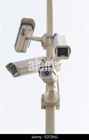 Group of four cameras on a pole Stock Photo