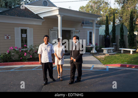 Vietnamese-Americans, Vietnamese-American people, adult woman, adult men, friends, Vietnamese funeral, Little Saigon, city of Westminster, California, Stock Photo