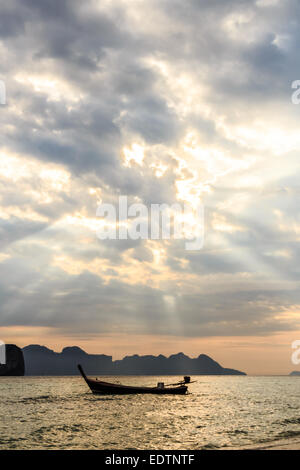 boat on sea and sky with sunbeam at Trang ,Thailand Stock Photo