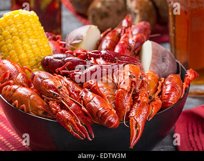 Creole style crawfish boil with boiled corn and red potatoes Stock Photo