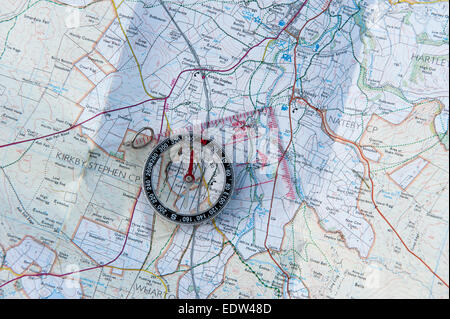 Compass on a detailed map. Stock Photo