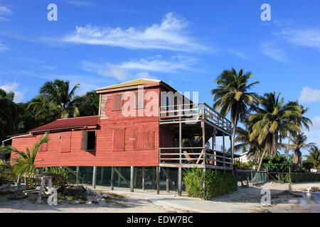 Traditional Wooden Beach Front House On Caye Caulker, Belize Stock Photo