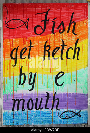 Creole Saying 'Fish Get Ketch By e Mouth' in Marin's Restaurant, Caye Caulker, Belize Stock Photo