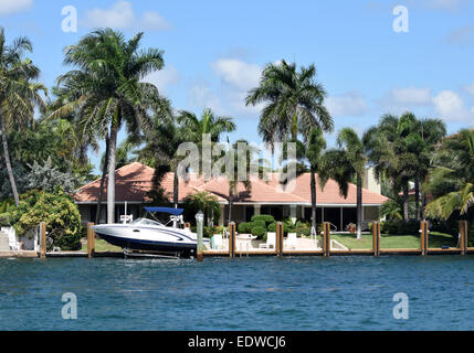 Luxury waterfront home with boat dock in Florida Stock Photo