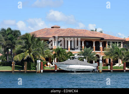 Expensive waterfront home and boat dock in Florida Stock Photo