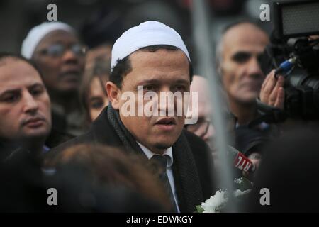 Paris, France. 10th Jan, 2015. The imam of Drancy, Hassen Chalghoumi, visits the site of a shop in Paris, France, 10 January 2015. According to the French public prosecutor's office, a hostage-taker had killed four of his hostages inside the shop on 9 January 2015. Photo: Fredrik von Erichsen/dpa/Alamy Live News Stock Photo