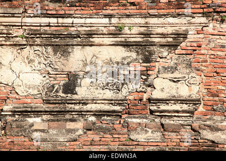 ruin of monastery temple wall from red brick using as background Stock Photo