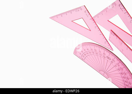 Close up shot of a pink maths set isolated on a white background Stock Photo