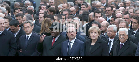 German Chancellor Angela Merkel (3rd from right) walks next to French President Francois Hollande (l) during the march against terrorism in Paris on 11 January 2015. Several European heads of state joined a manifestation to express their solidarity following the recent terrorist attacks in France and to commemorate the victims of the attack on the French Charlie Hebdo satirical magazine and a kosher supermarket in Paris. Others are from left: Israel's Prime Minister Benjamin Netanjahu, former French President Nicolas Sarkozy, President of Mali Ibrahim Boubacar Keïta, Palestinian President Mahm Stock Photo