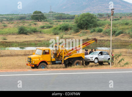 TRICHY, INDIA - FEBRUARY 15: After the accident, the car raise evacuate. India, Tamil Nadu, near Trichy. February 15, 2013 Stock Photo