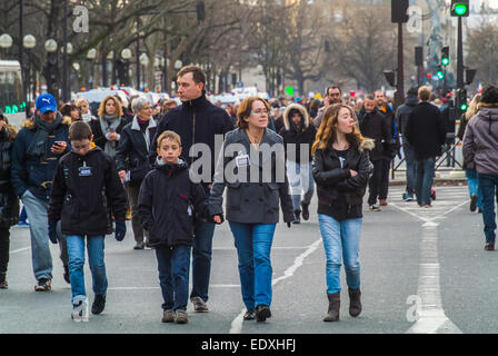 Paris, Street, France. Family in Crowd Marching on Street, in huge  National Demonstration Against Terrorism, After Attack on French Newspaper, 'Charlie Hebdo', 'je suis Charlie paris' Stock Photo