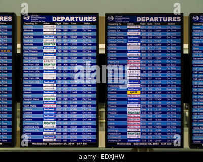 flight schedule monitor at airport Stock Photo - Alamy