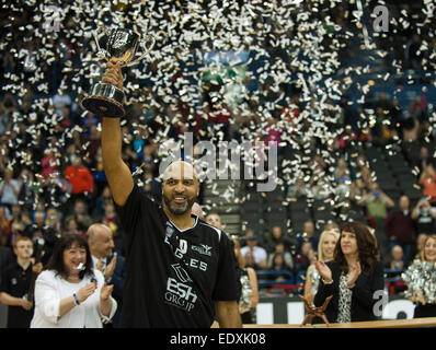 Birmingham, UK. 11th January, 2015.  ESH Newcastle Eagles Charles Smith shows the BBL Trophy to the fans after their win over Glasgow Rocks 84-71.   Credit:  Stephen Bartholomew/Alamy Live News Stock Photo