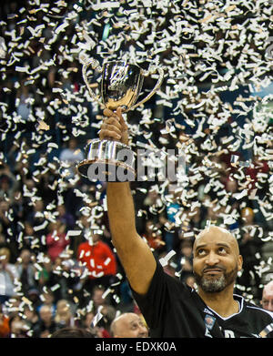 Birmingham, UK. 11th January, 2015.  ESH Newcastle Eagles Charles Smith shows the BBL Trophy to the fans after their win over Glasgow Rocks 84-71.   Credit:  Stephen Bartholomew/Alamy Live News Stock Photo