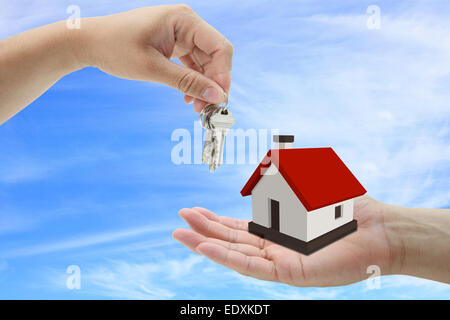 concept of buying house property with blue sky background Stock Photo