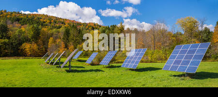 IRASVILLE, VERMONT, USA - Solar power panels in field, Mad River Valley. Alternative energy. Stock Photo