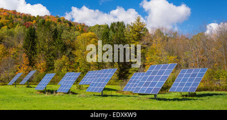 IRASVILLE, VERMONT, USA - Solar power panels in field, Mad River Valley. Alternative energy. Stock Photo