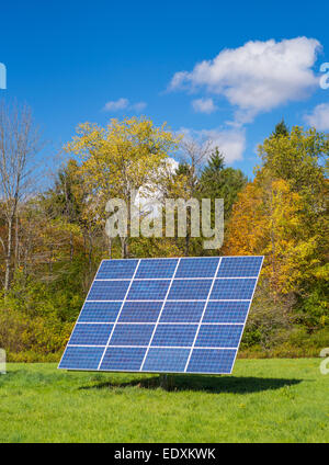 IRASVILLE, VERMONT, USA - Solar power panel in field, Mad River Valley. Alternative energy. Stock Photo