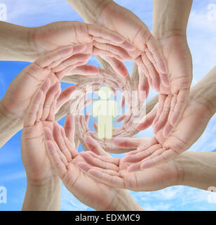 A diverse business team holding people for life insurance concept Stock Photo