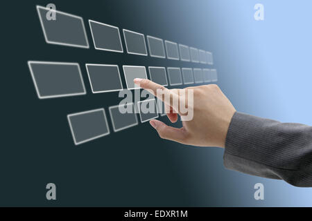 asian business man touching on touch screen interface Stock Photo
