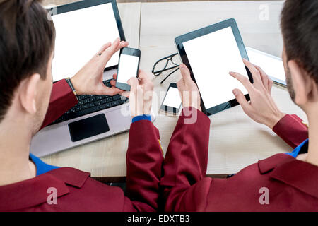Using different digital gadgets Stock Photo