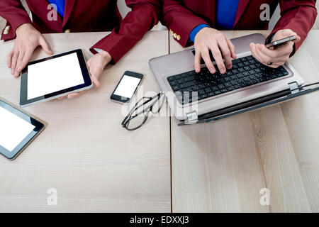 Using different digital gadgets Stock Photo