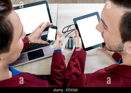 Using different digital gadgets Stock Photo