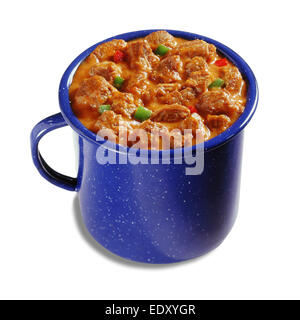 Chili in mug on white background Stock Photo