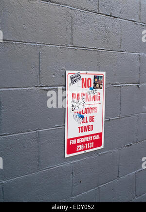 No Parking Sign with Graffiti in Asheville North Carolina Stock Photo